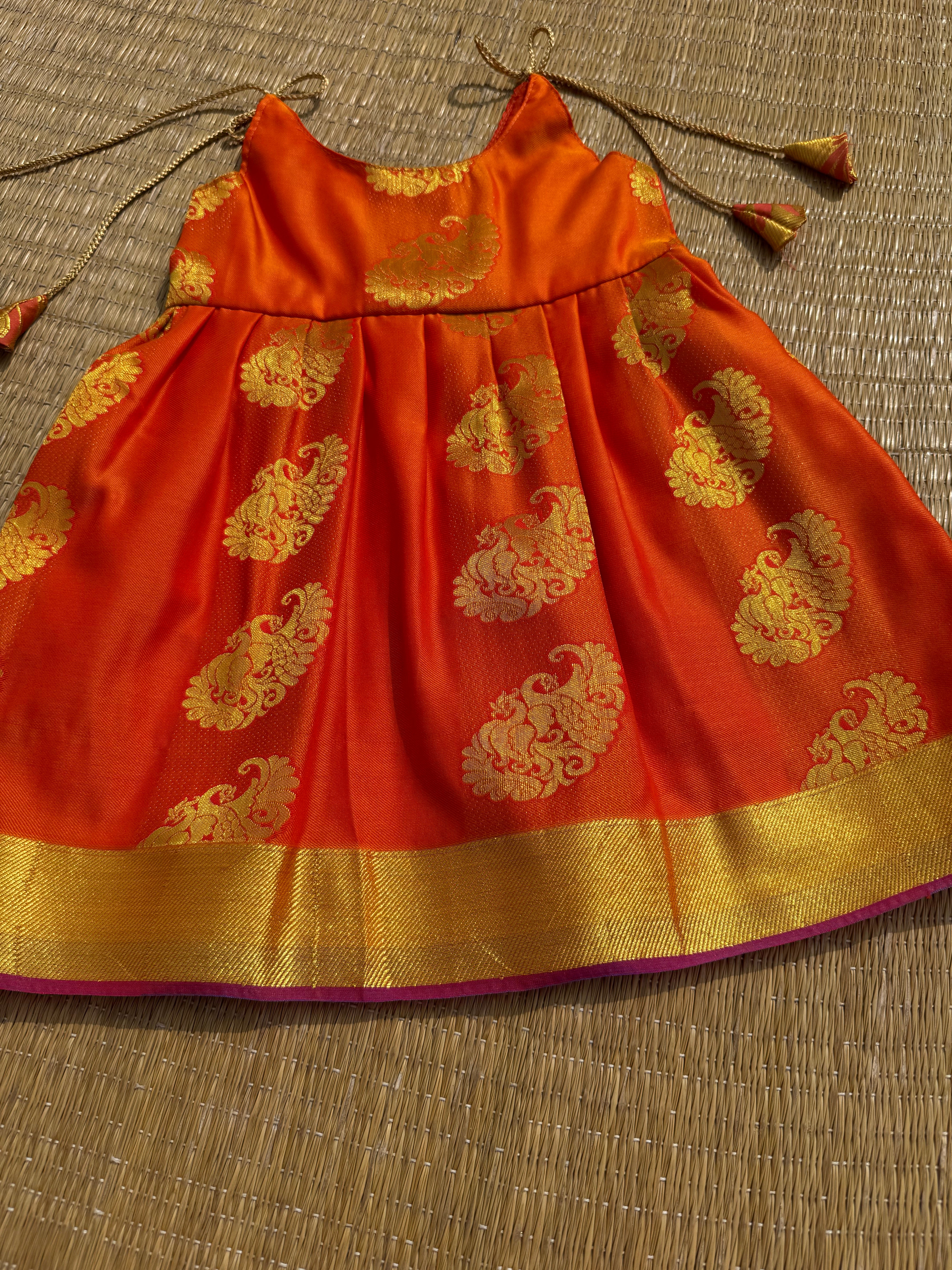 Little Dhiya - Orange with zari tie knot frock for babies