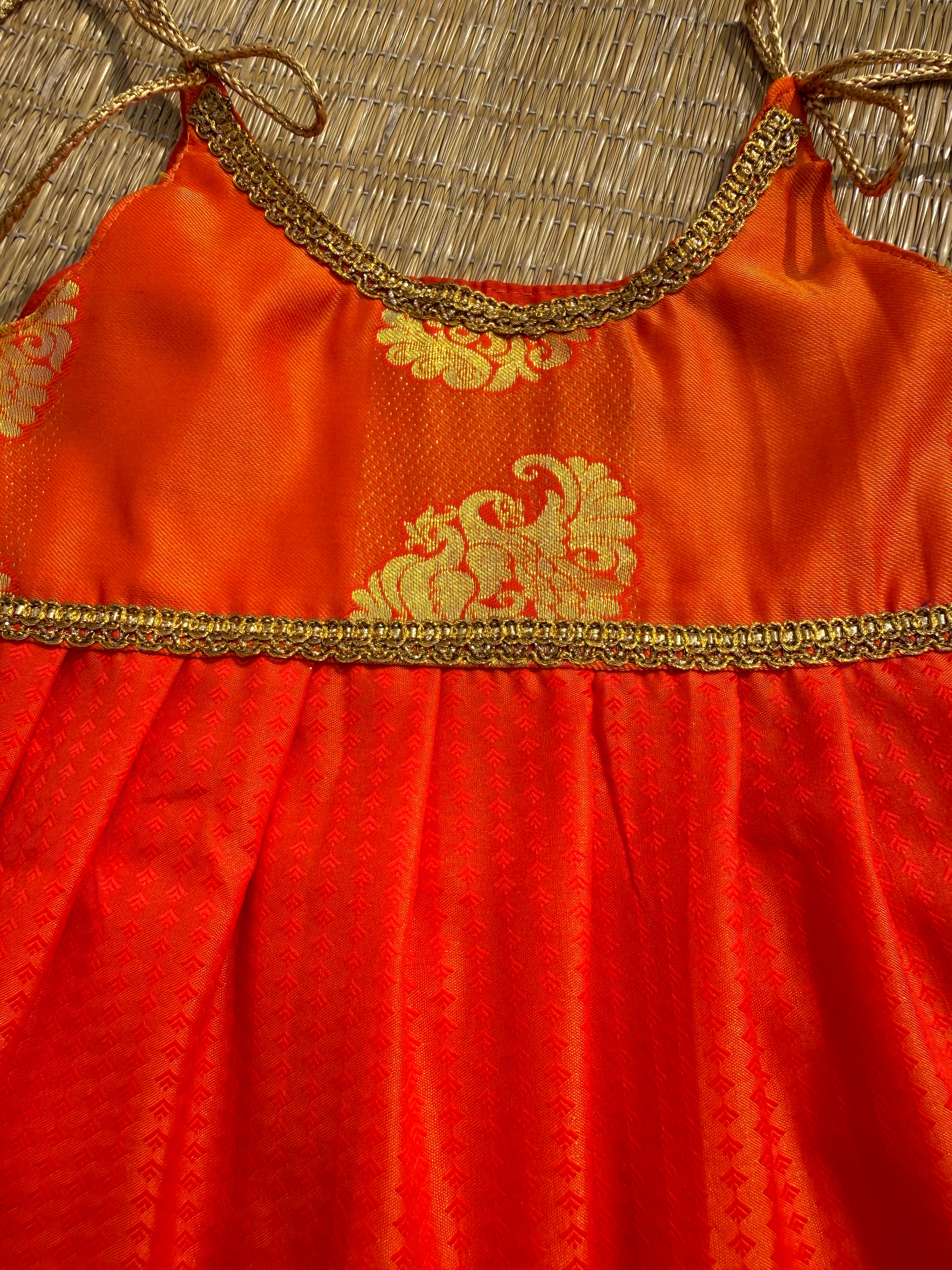 Little Dhiya - Burnt Orange Golden zari tie knot frock for babies