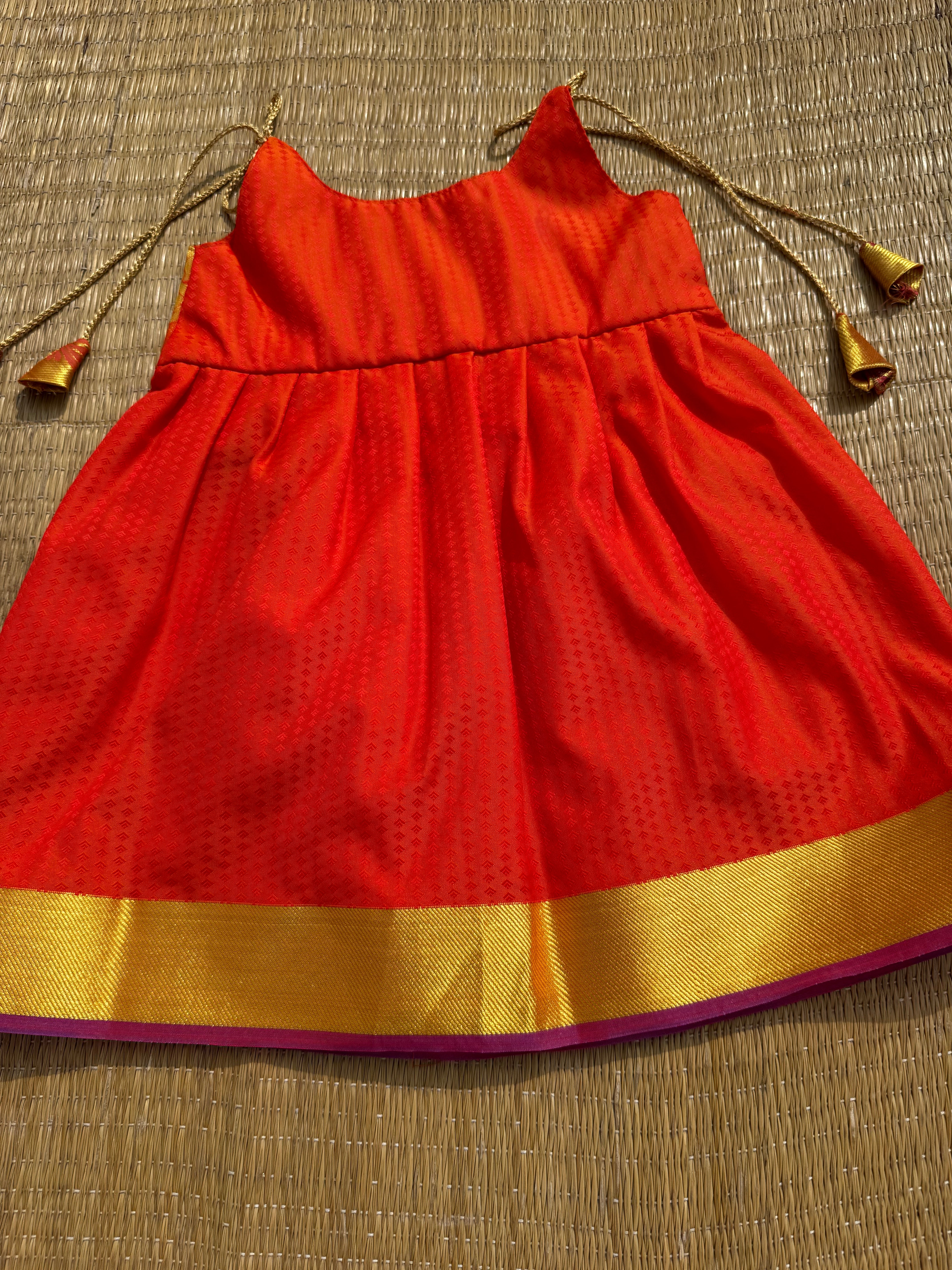 Little Dhiya - Burnt Orange Golden zari tie knot frock for babies