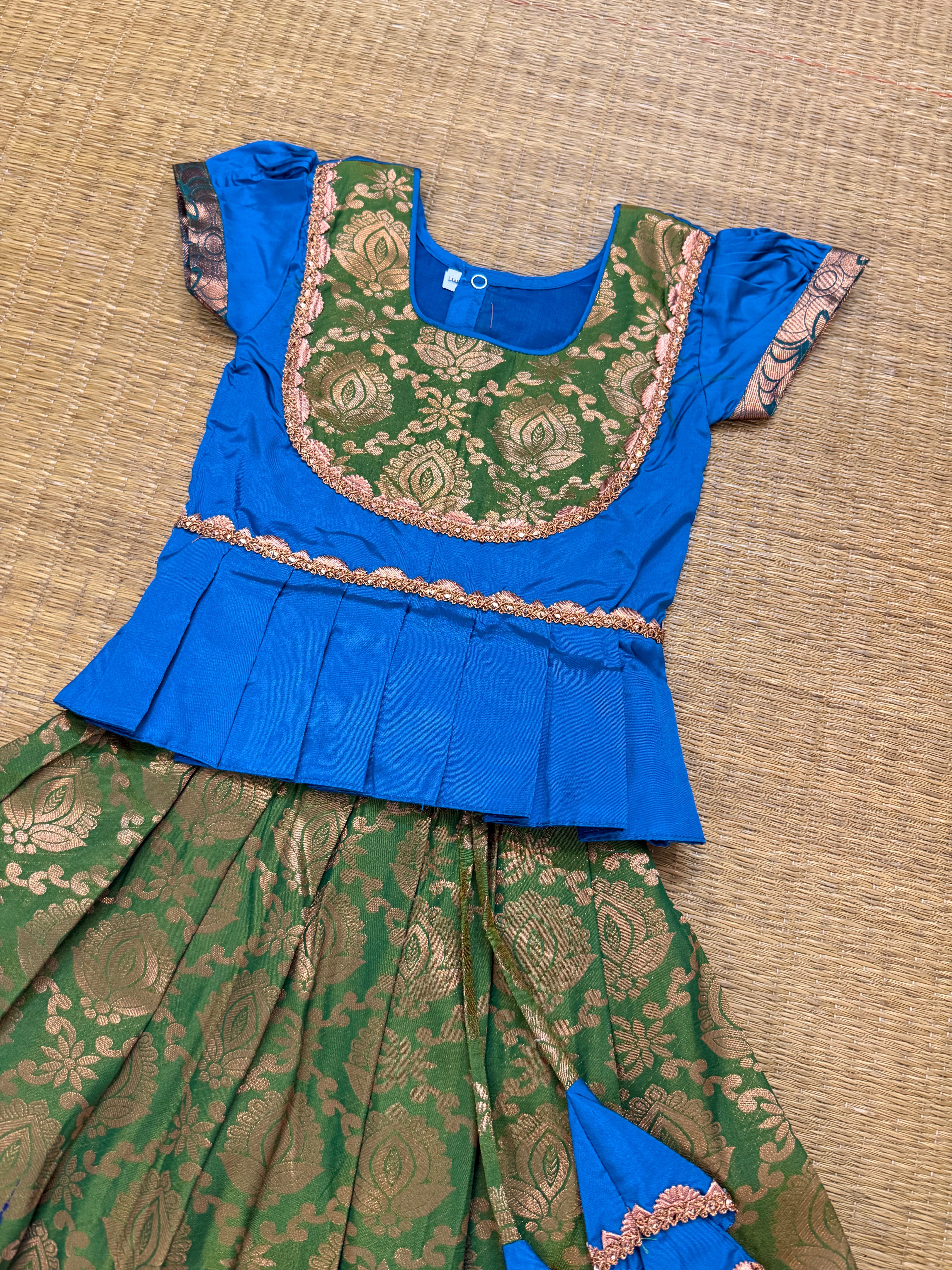 Aarathiya Kids Pattu Pavadai- teal green top with green skirt