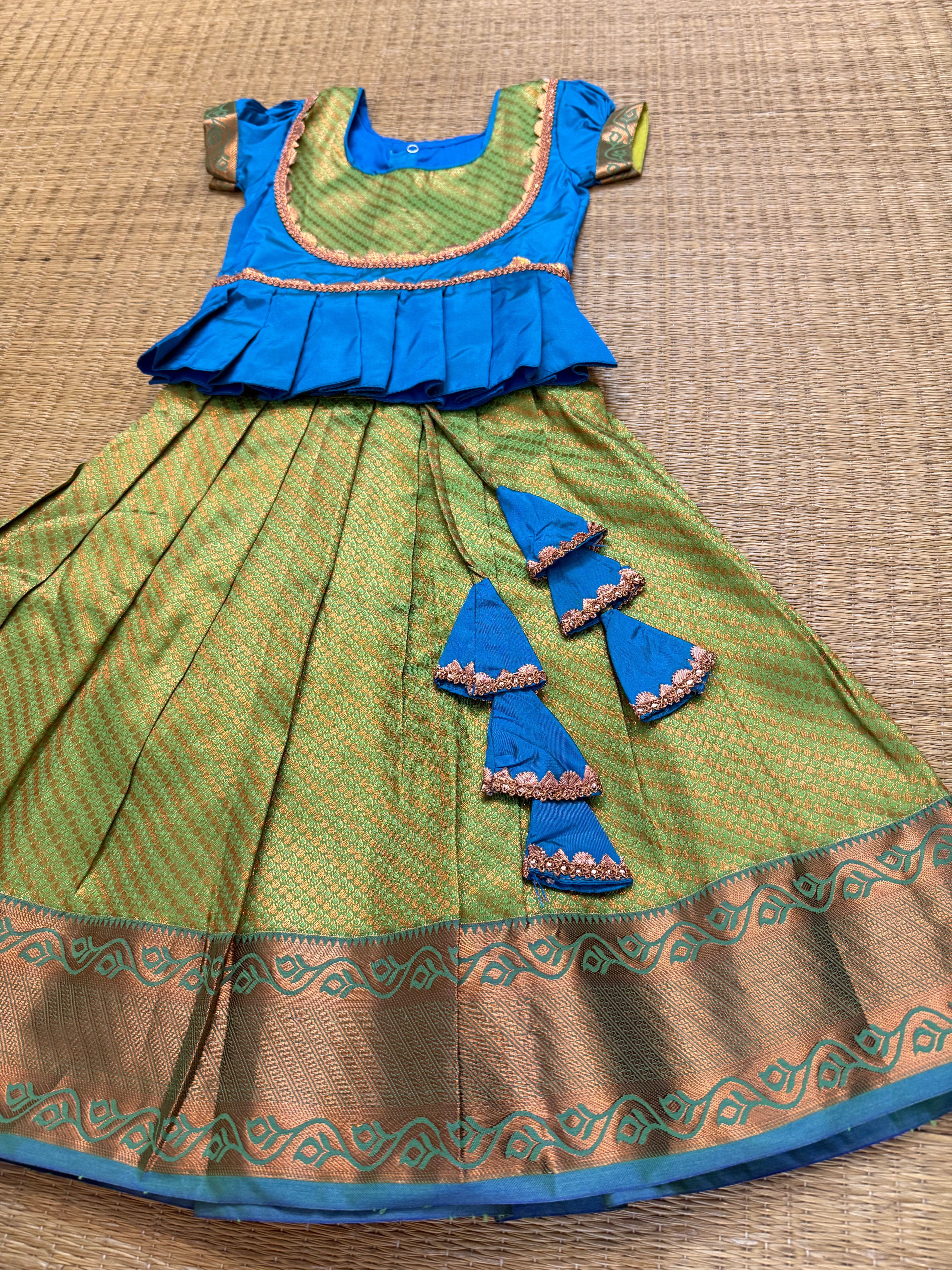 Aarathiya Kids Pattu Pavadai- light blue top with green skirt