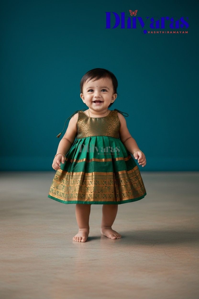 Little Dhiya - Dark green copper zari tie knot frock for babies
